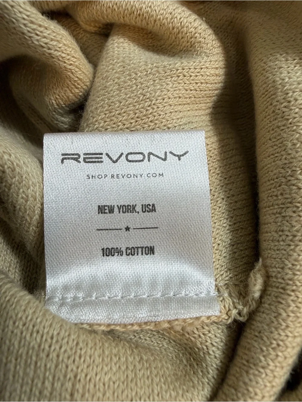 Cream Beanie Hat with Small Black Logo Tab